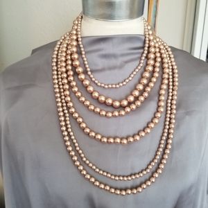 Stunning champagne rose colored multi strand pearl necklace